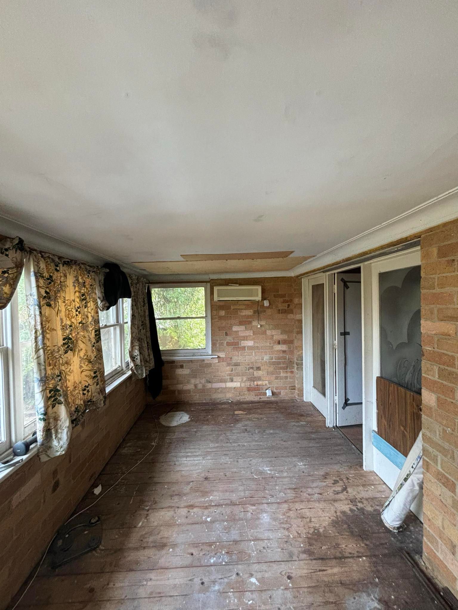This is a before pic of a water-damaged ceiling that had a patch over it to stop falling. This is the other side of the room's ceiling. The job was in the center of Castlemaine