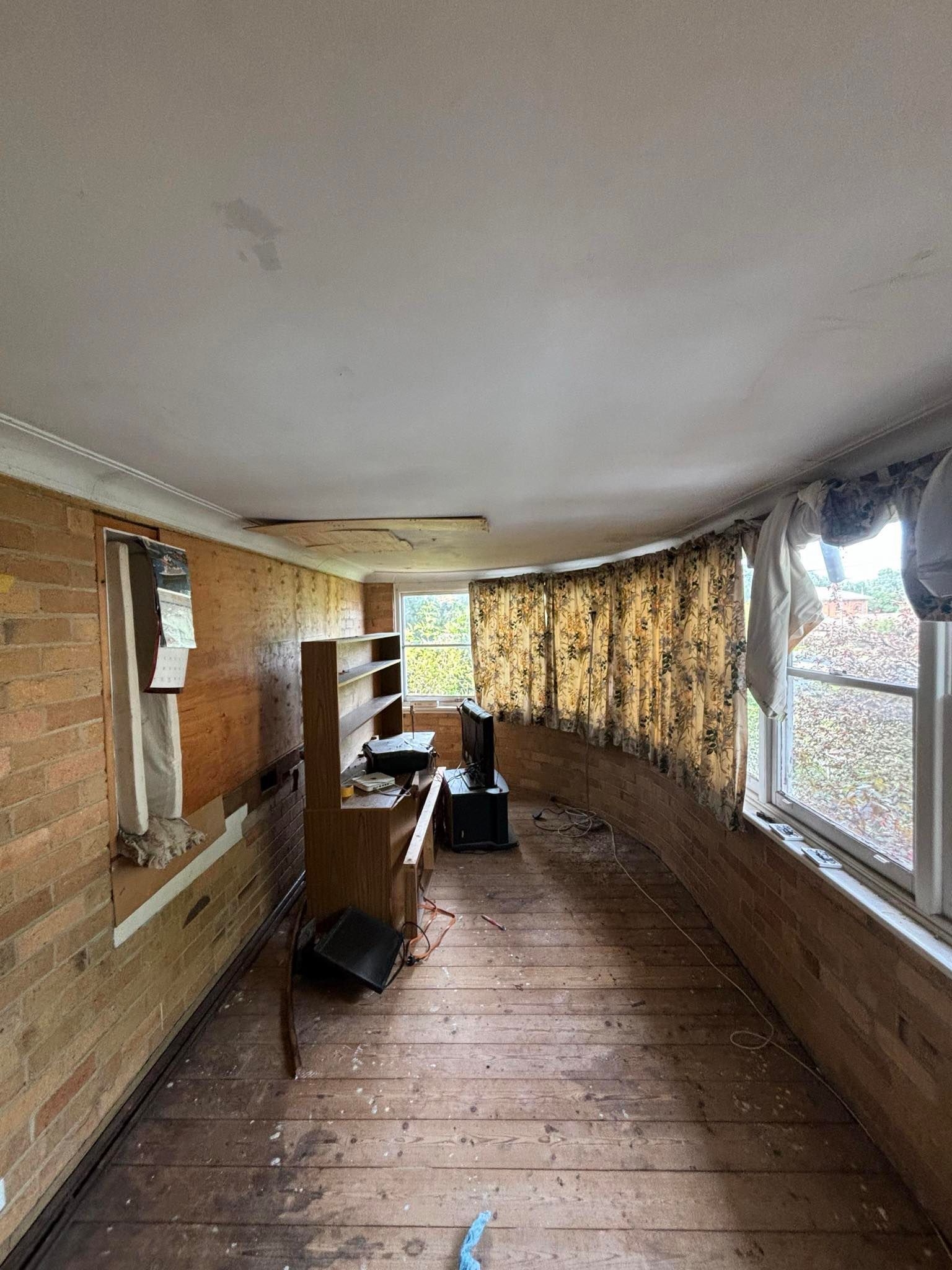 This is a before pic of a water-damaged ceiling that had a patch over it to stop falling. The job was in the center of Castlemaine