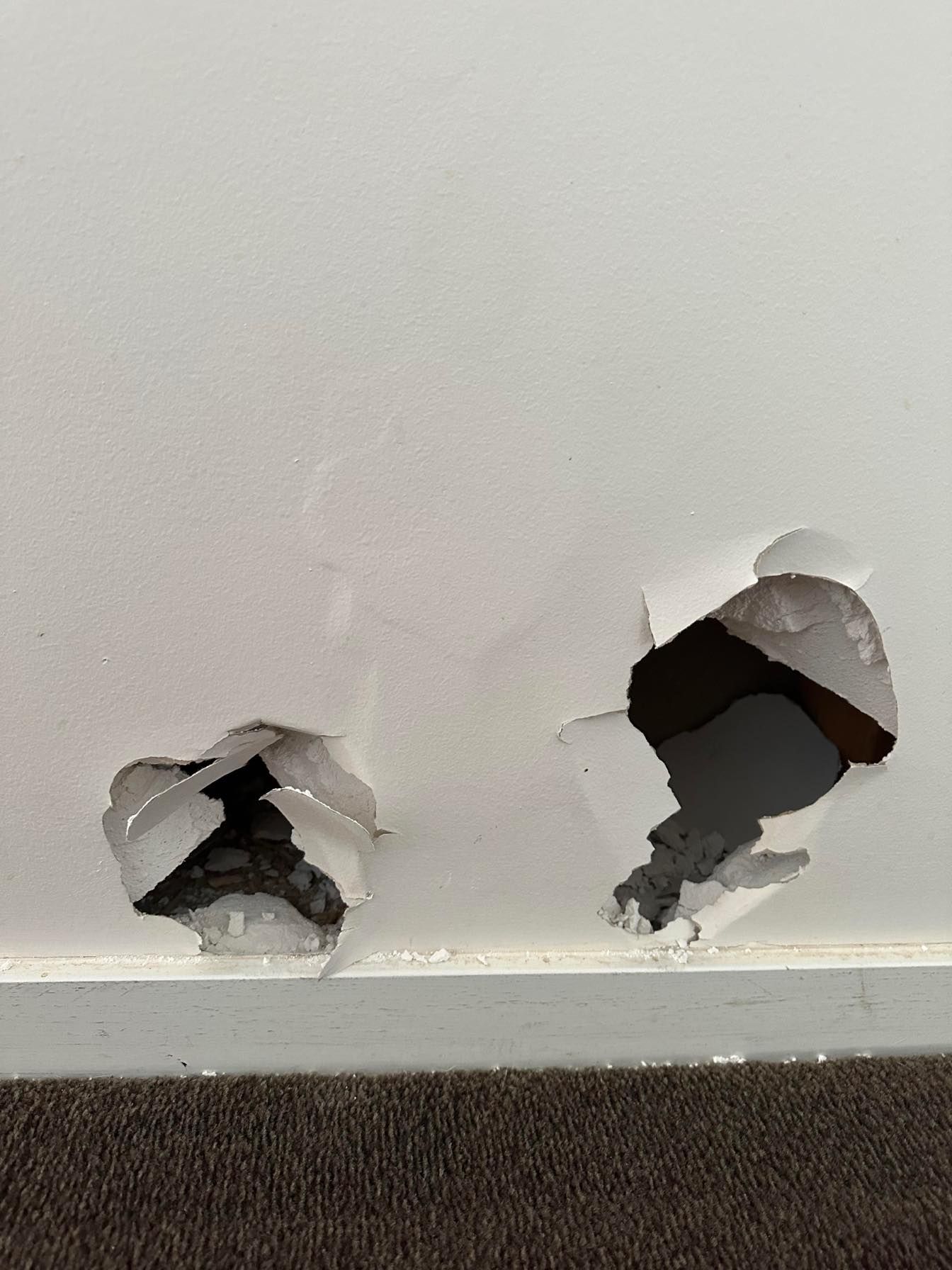 to holes in the wall before pictures in Epsom