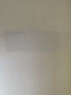finished repair of self holes after the picture of plaster repair