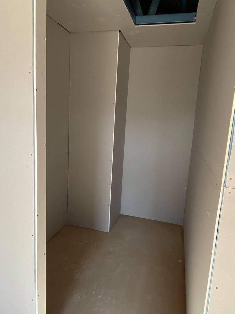 this is a walk in robe that has just had the plaster sheet put up in  a job in bendigo