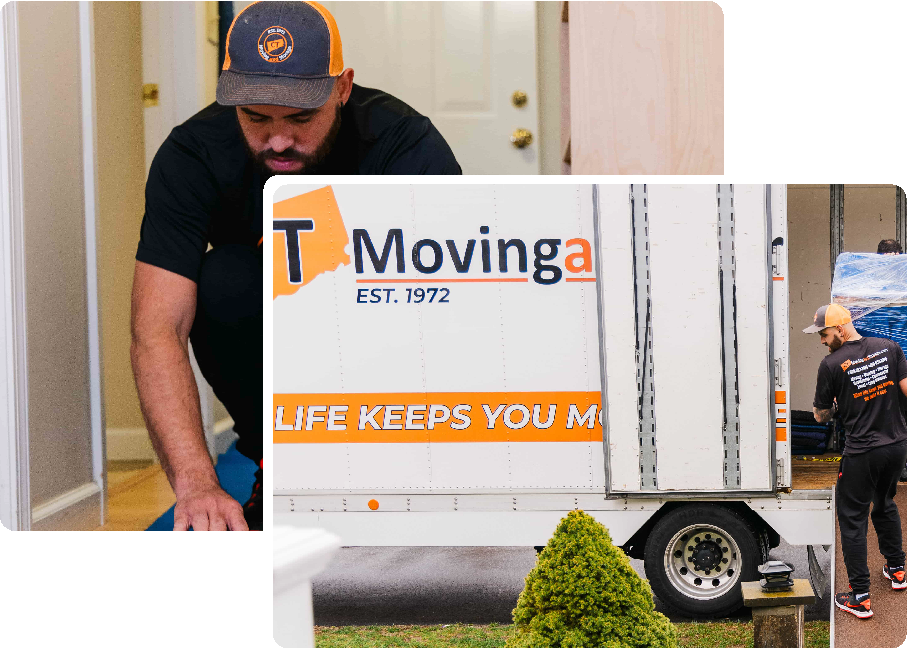 A man is standing in front of a t moving truck.