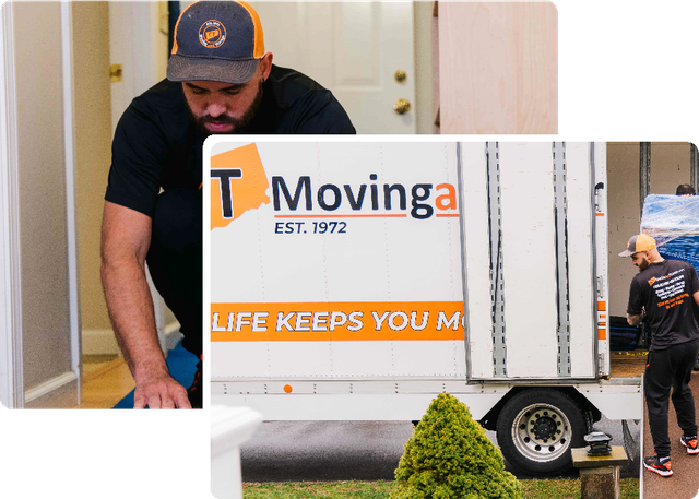 A man is standing in front of a t moving truck.