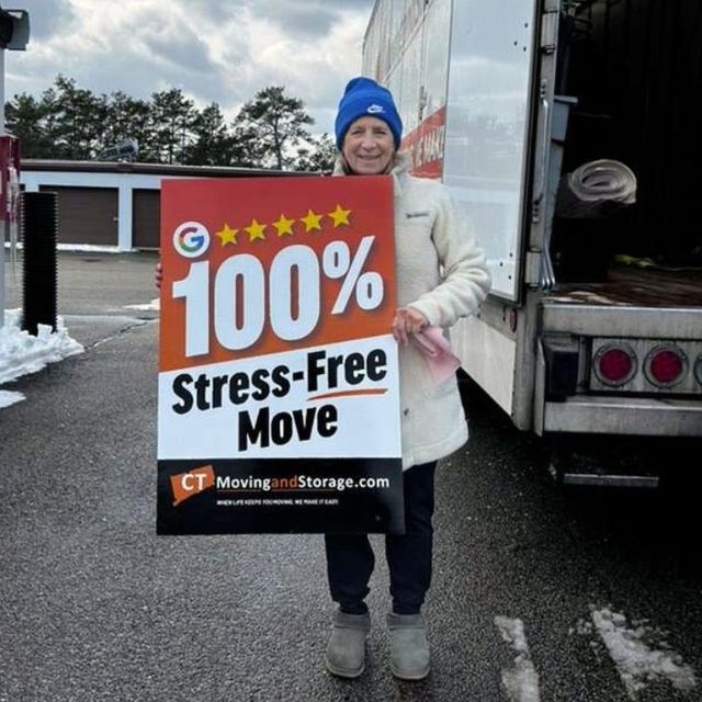 Woman holding a sign, 