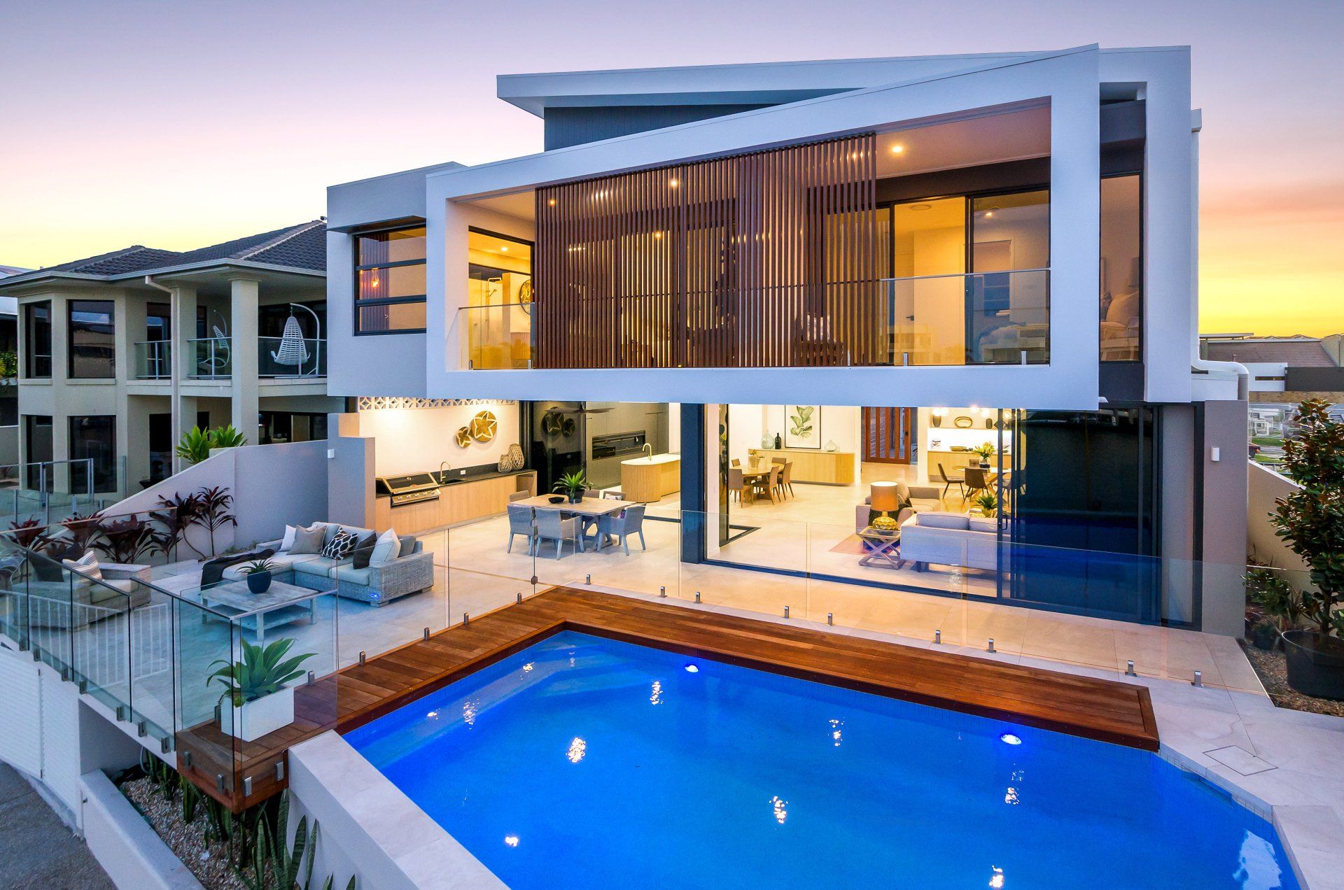 House At Night With Pool — Molendinar, QLD — R & K Electrics Pty Ltd