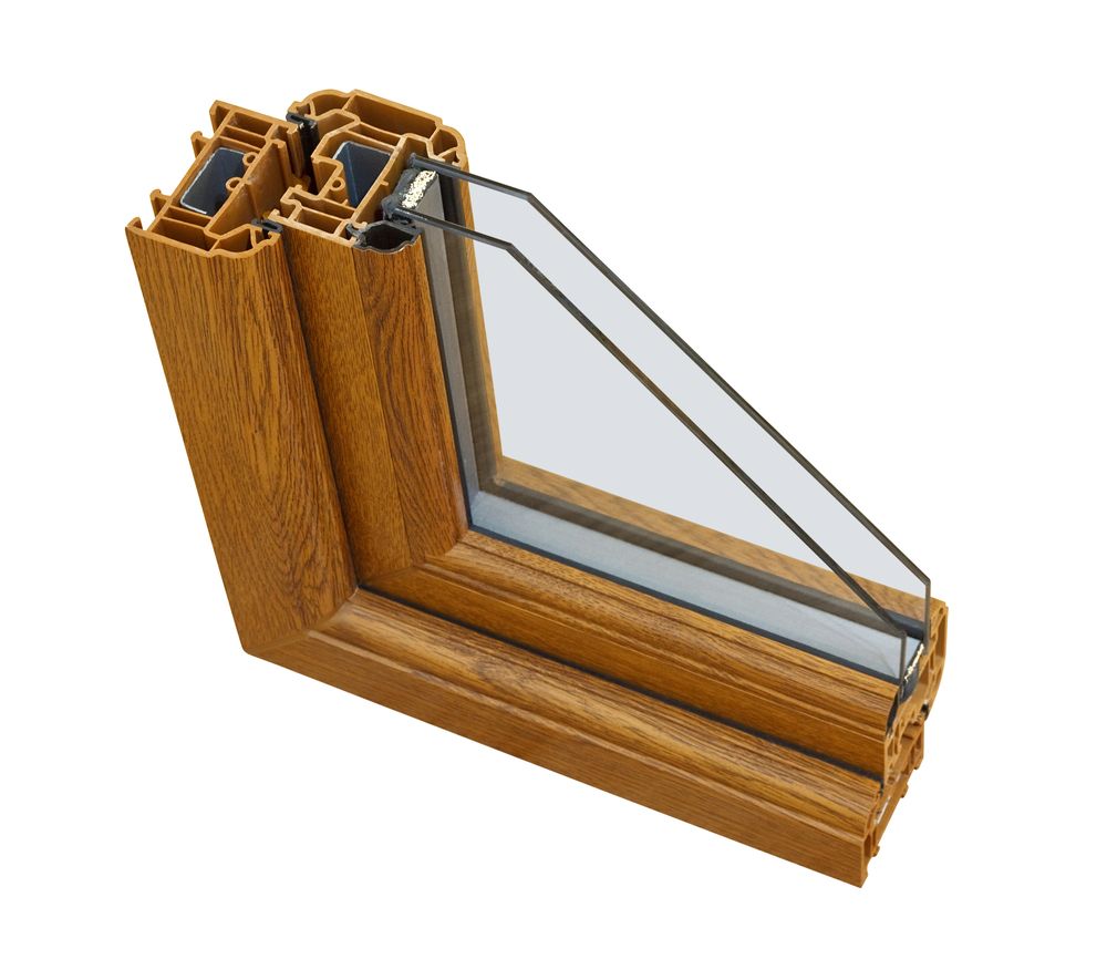 A wooden window with three layers of glass