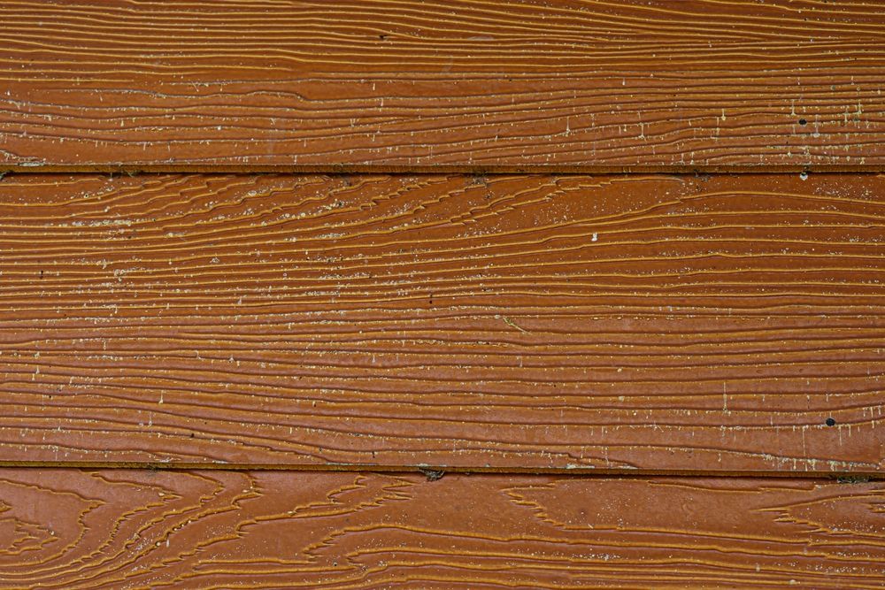 A close up of a wooden surface with a striped pattern