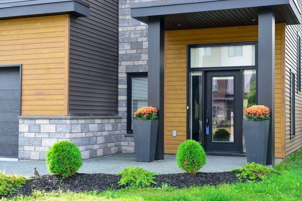 A home with vinyl and wood siding.