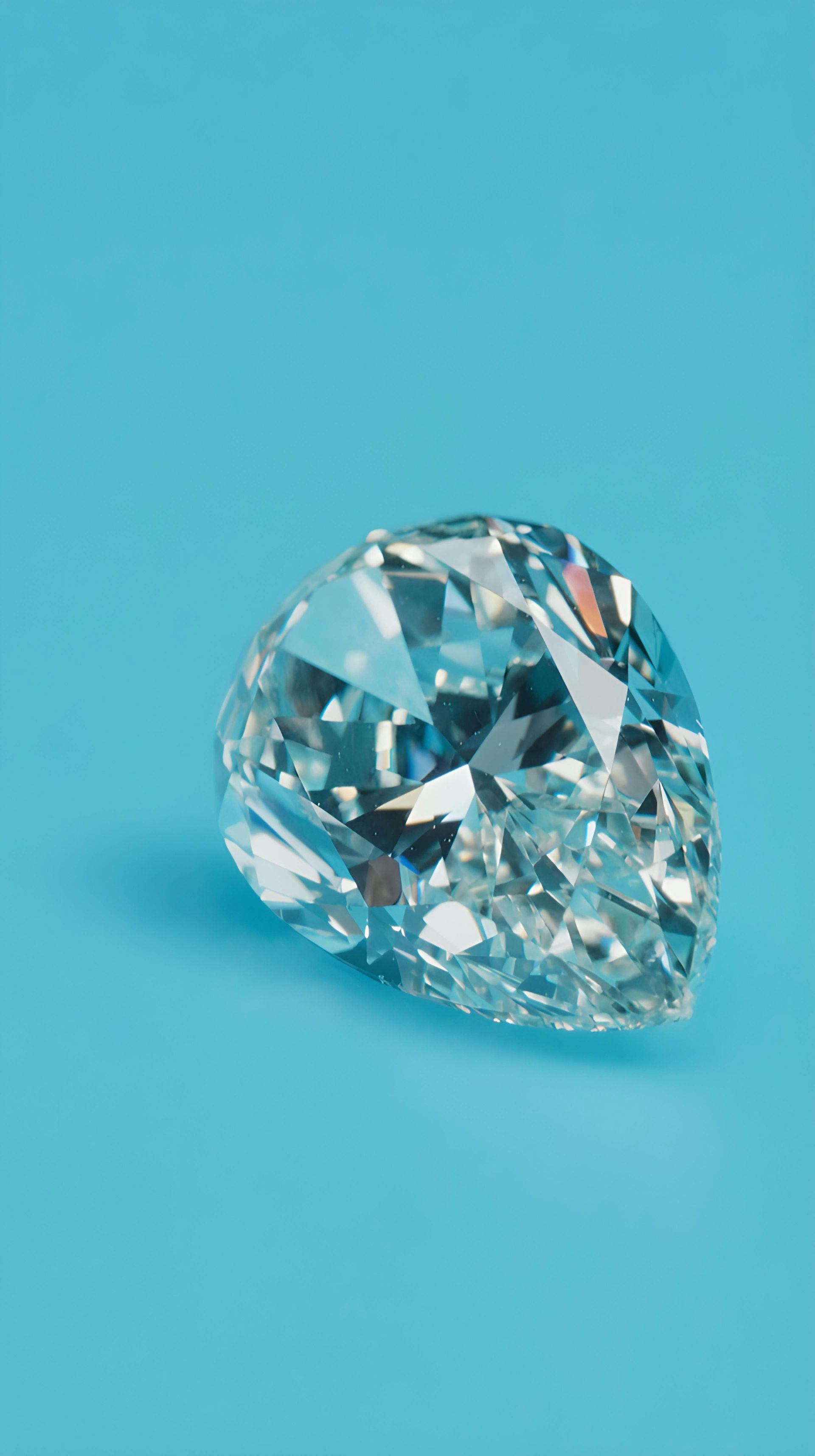 Email Us About Sponsoring This Event Clear faceted diamond on a bright blue background