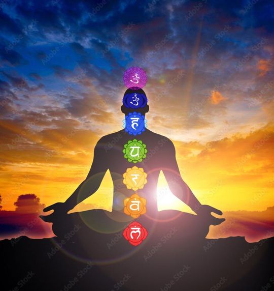 human aura with seven sparkling chakras