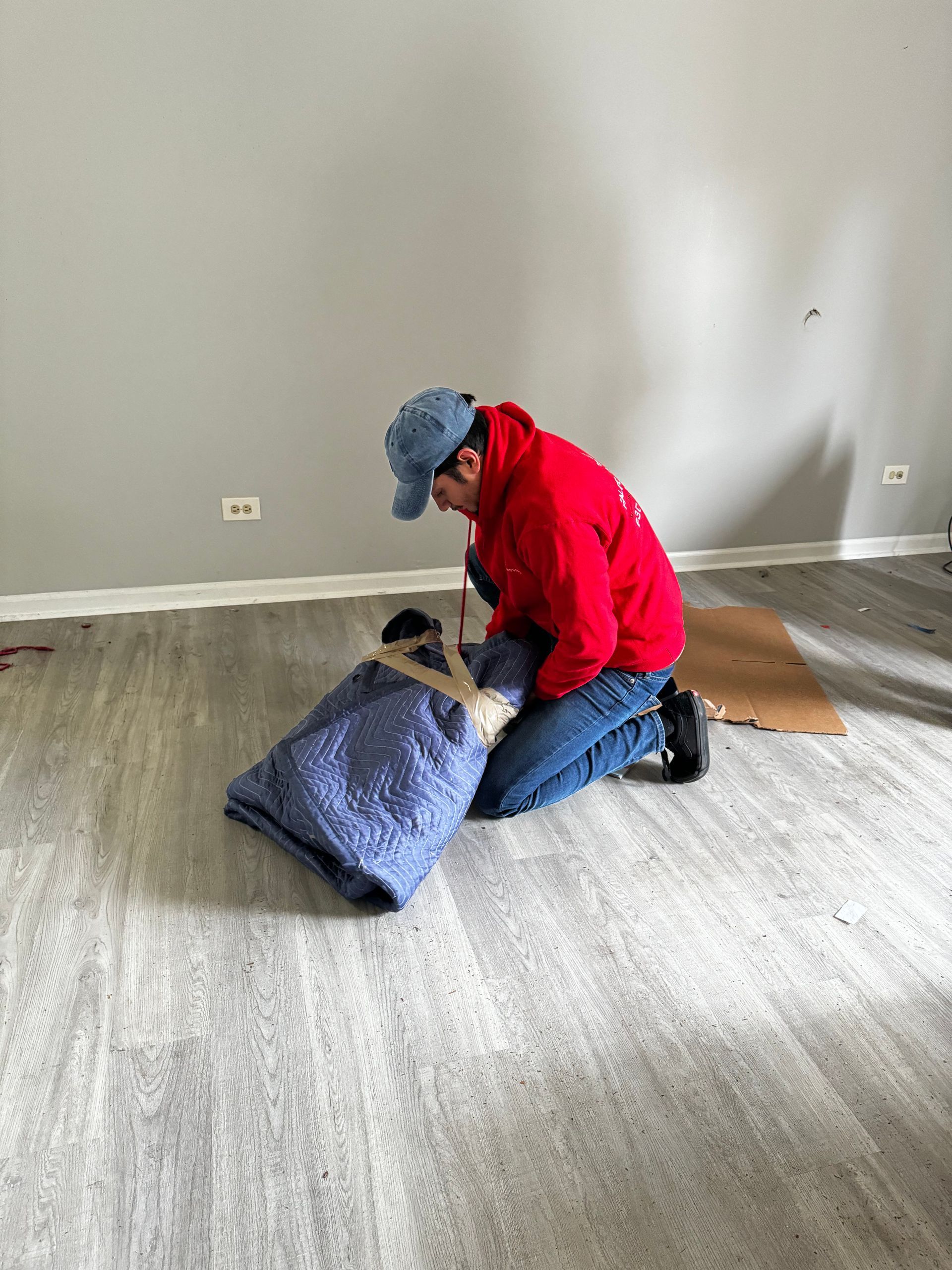 Wrapped furniture prepared with white glove moving care