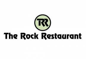 A logo for a restaurant called the rock restaurant