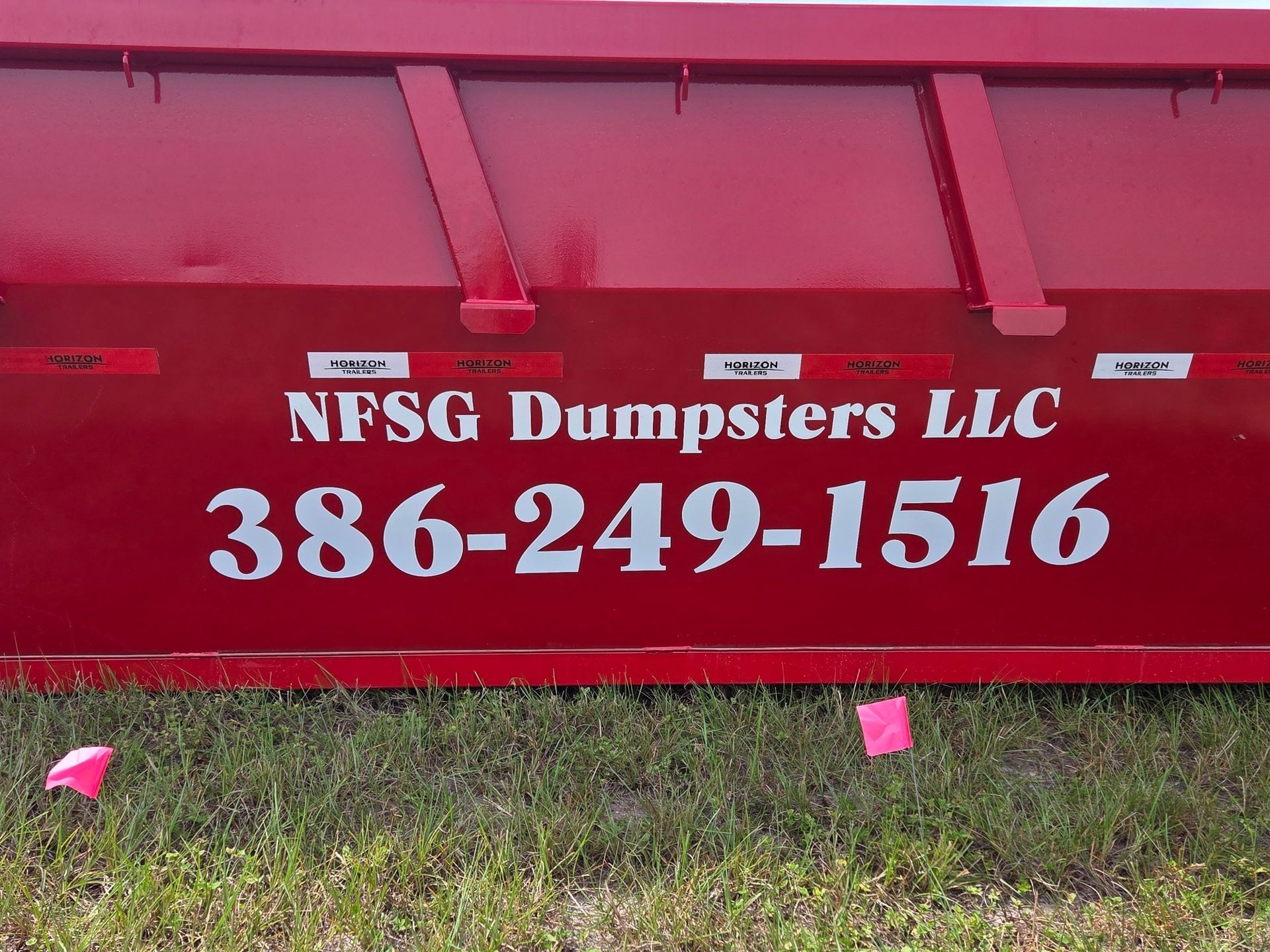 Red dumpster with 