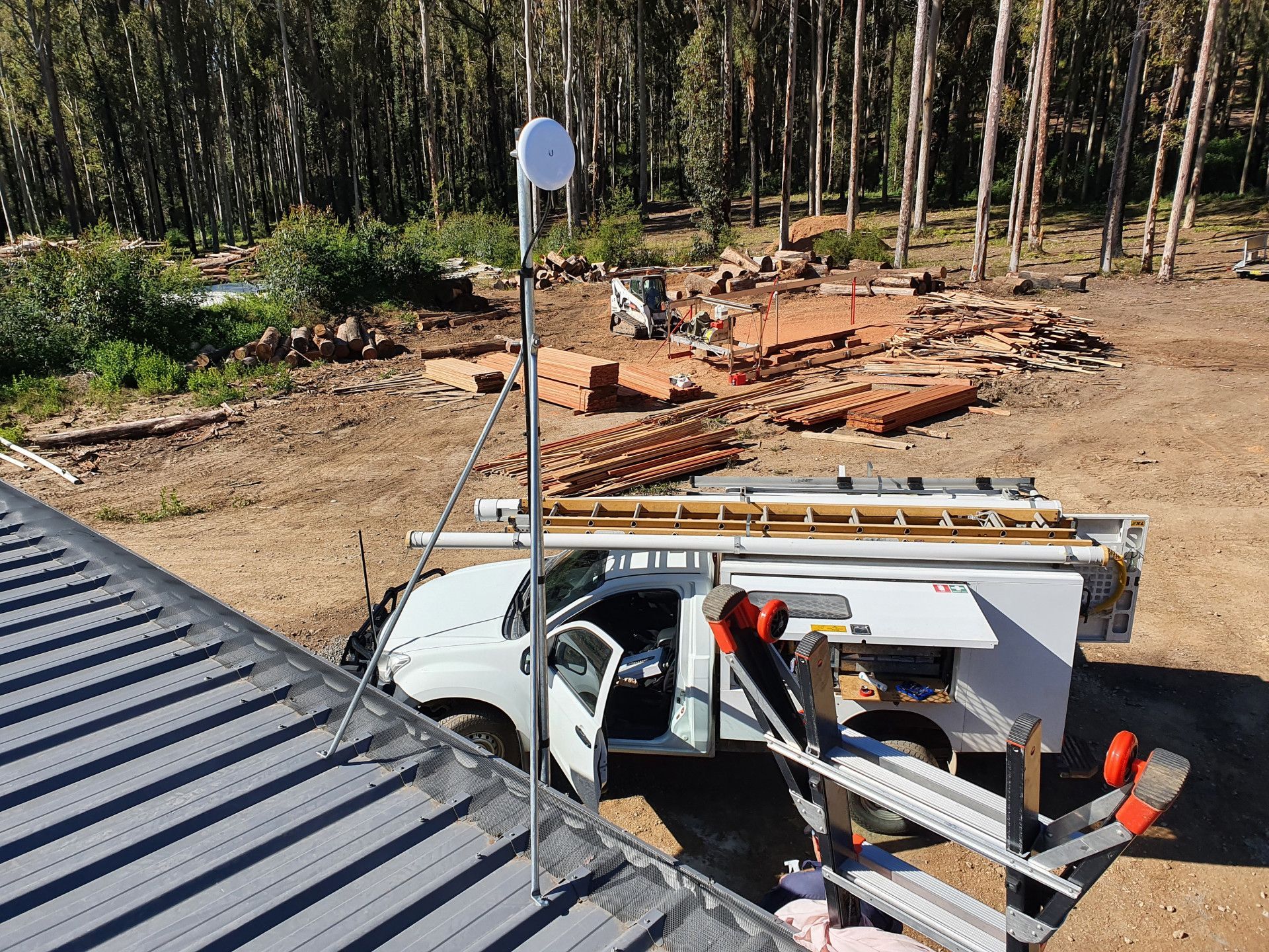 A White Truck Parked in a Dirt Field — AitkenTech in Moruya, NSW