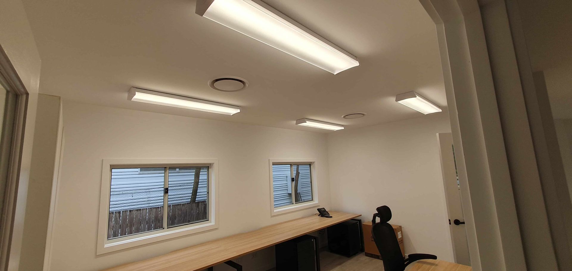 A Shadow of a Person is Cast on the Roof of a Building — AitkenTech in Ulladulla, NSW