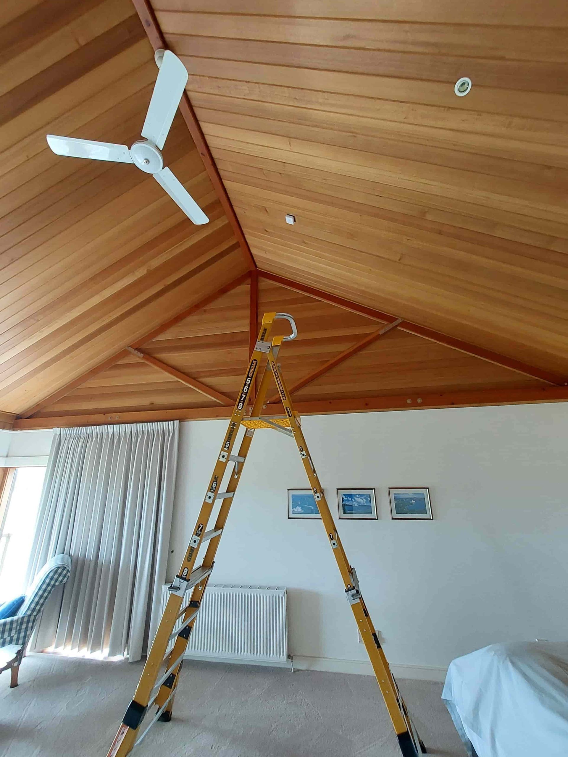 A Wooden Ceiling With a Light on It in a Room — AitkenTech in Narooma, NSW