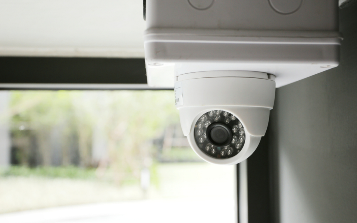 A Security Camera is Hanging From the Ceiling Next to a Window — AitkenTech in Batemans Bay, NSW