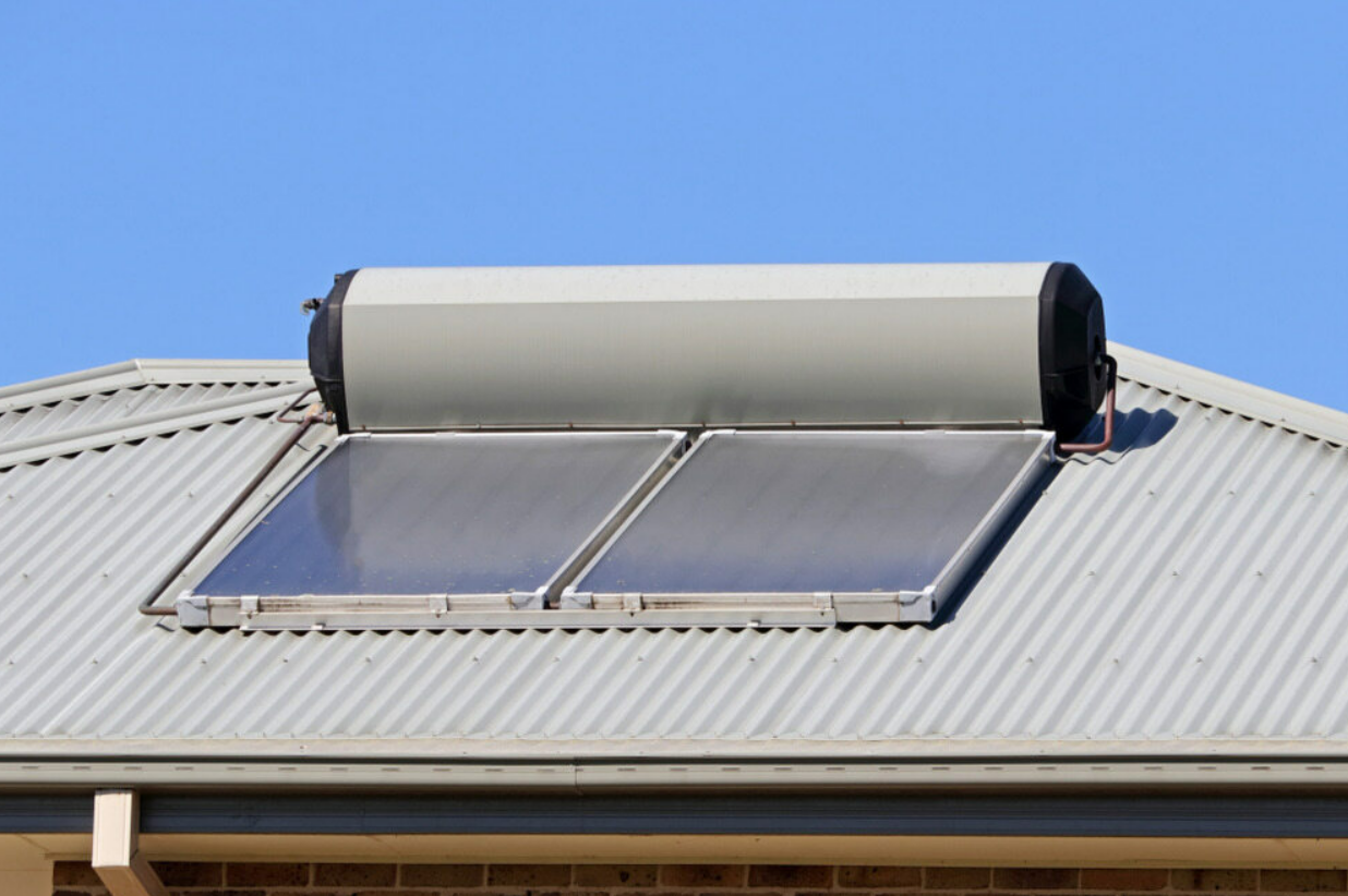 A Solar Water Heater is Mounted on the Roof of a House — AitkenTech in Bermagui, NSW