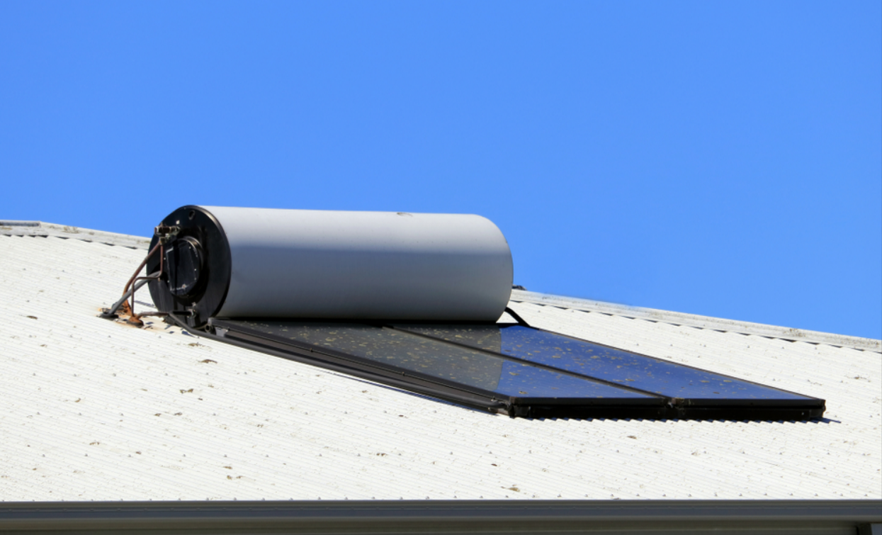 A Solar Water Heater is Sitting on Top of a White Roof — AitkenTech in Narooma, NSW