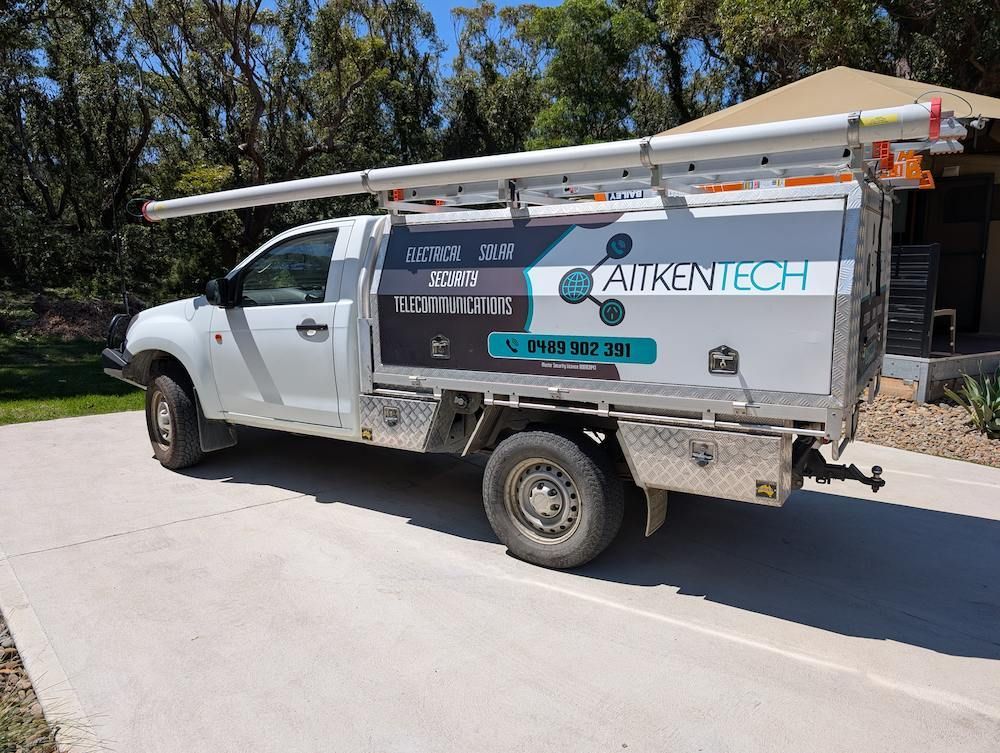 A White Truck is Parked on the Side of the Road — AitkenTech in Moruya, NSW