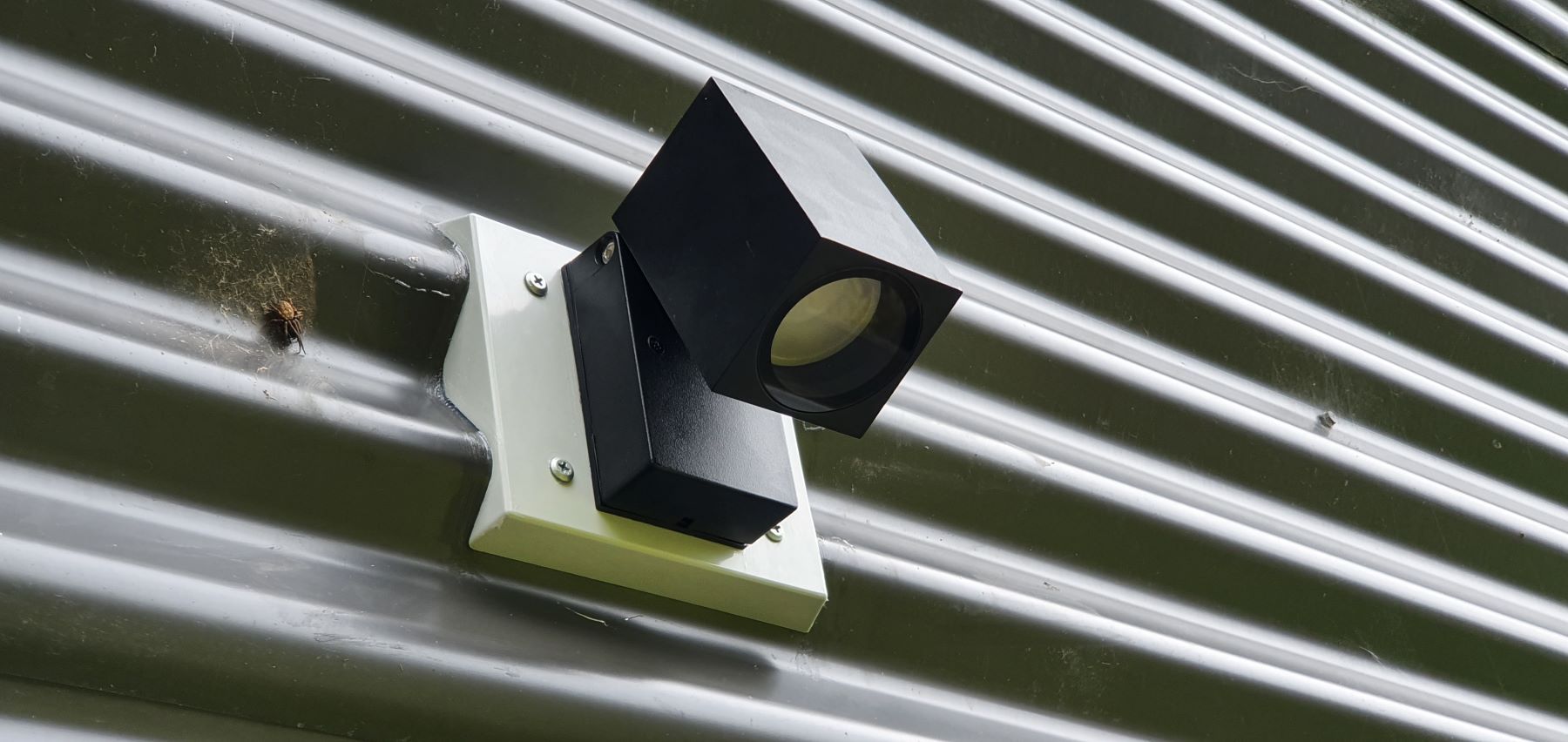 A Security Camera is Mounted on the Side of a Building — AitkenTech in Moruya, NSW
