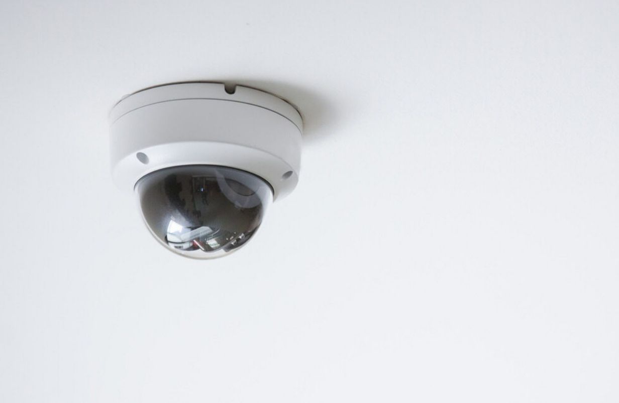 A Security Camera is Hanging From the Ceiling of a Building — AitkenTech in Moruya, NSW