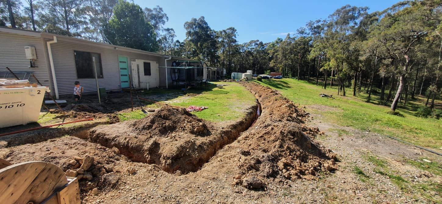A Pile of Dirt is Sitting in Front of a House — AitkenTech in Ulladulla, NSW