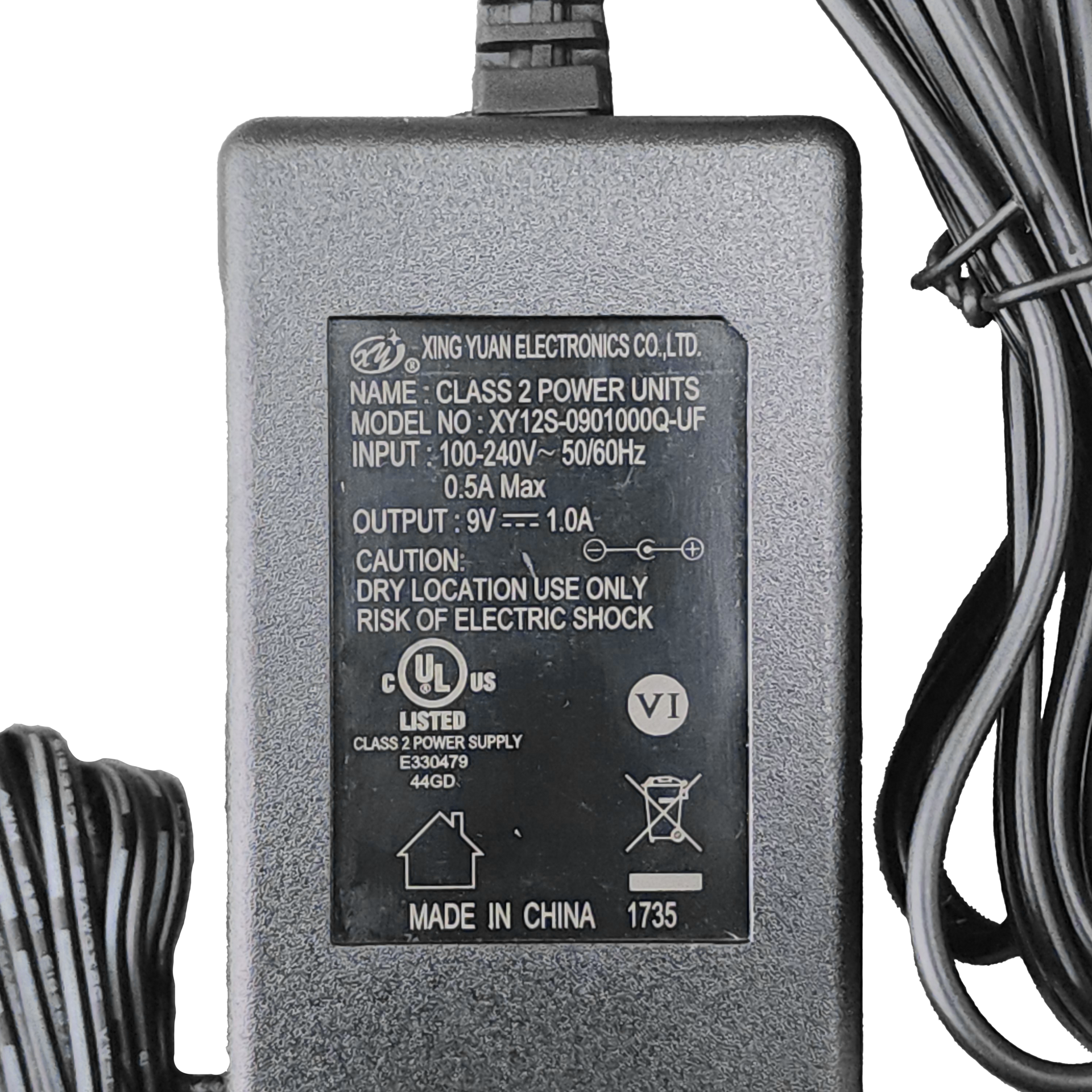 A black power supply with a cord attached to it