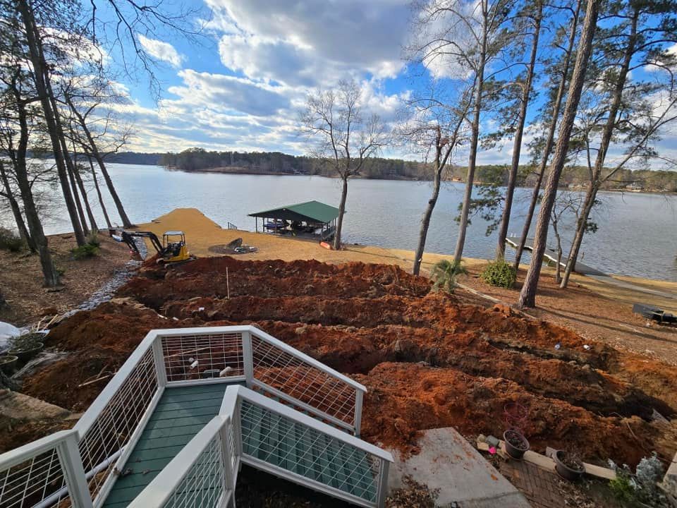 A truck is parked next to a hole in the ground.