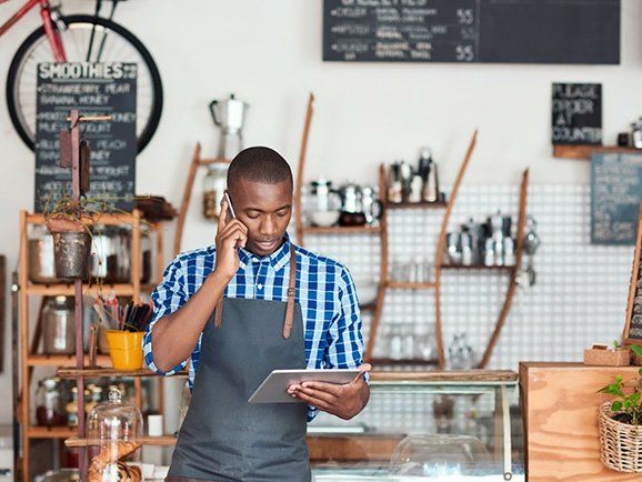 Man Using His Phone — Phoenix, AZ — Phoenix Access Control