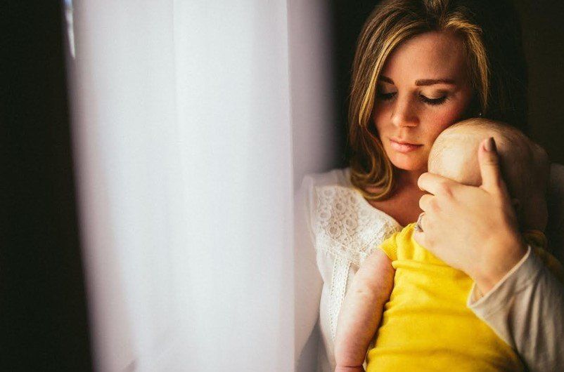 Mother hugging baby — Phoenix, AZ — Phoenix Access Control