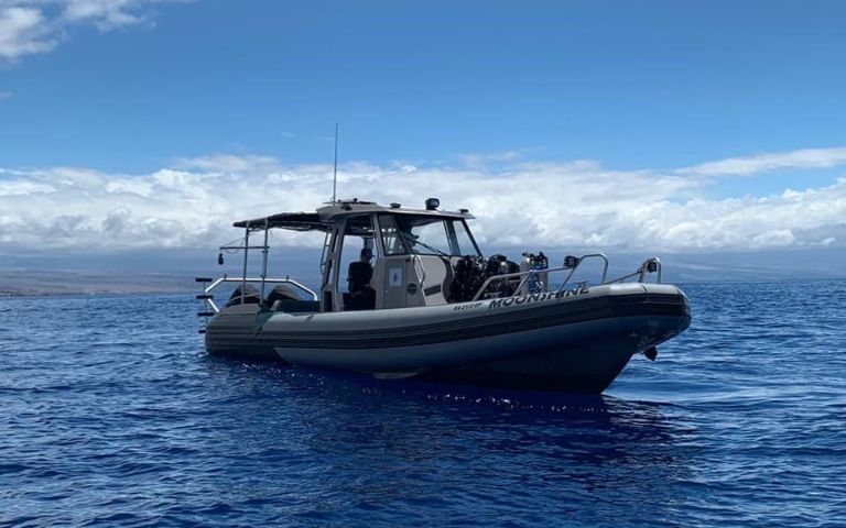 Private Charter Moonshine boat in the ocean