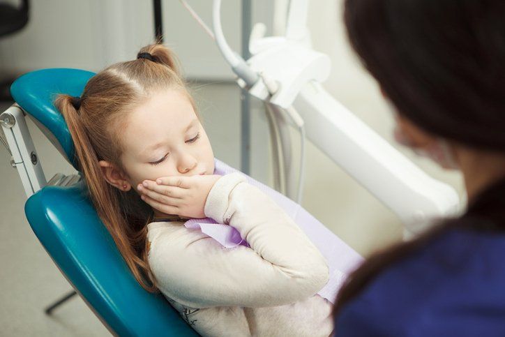 Child Sitting on Dental Chair — Ashburn, VA — Ronald Ray D.D.S. P.C. & Associates