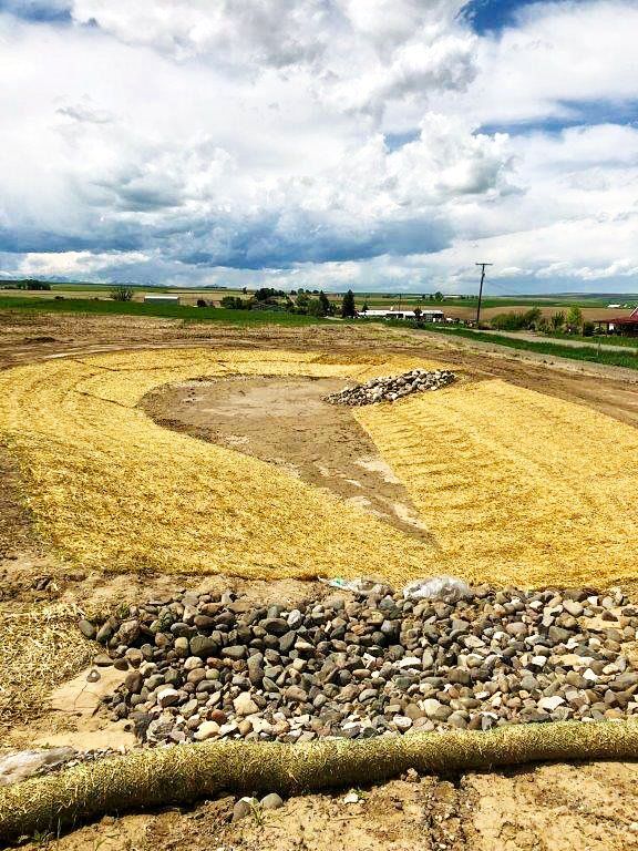 A large field with a lot of dirt and rocks in it.