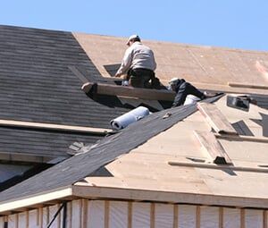 worker installing the roof