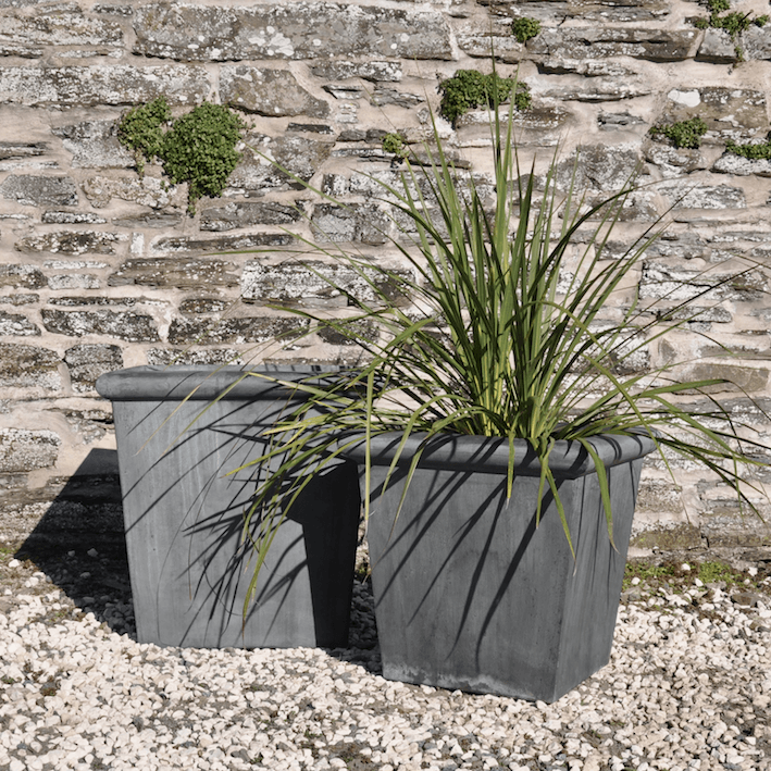 Roll Top Planters in Large and Medium with stone wall
