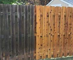 A before and after picture of a wooden fence.