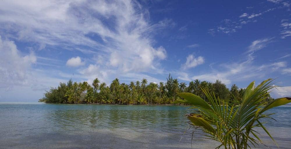 There is a small island in the middle of the ocean.