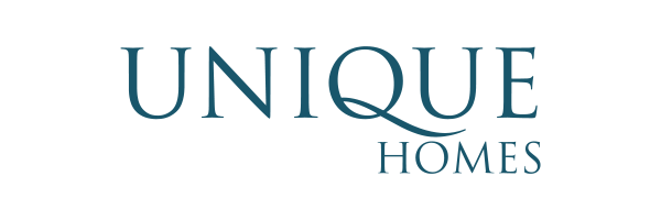 The logo for unique homes is blue and white.