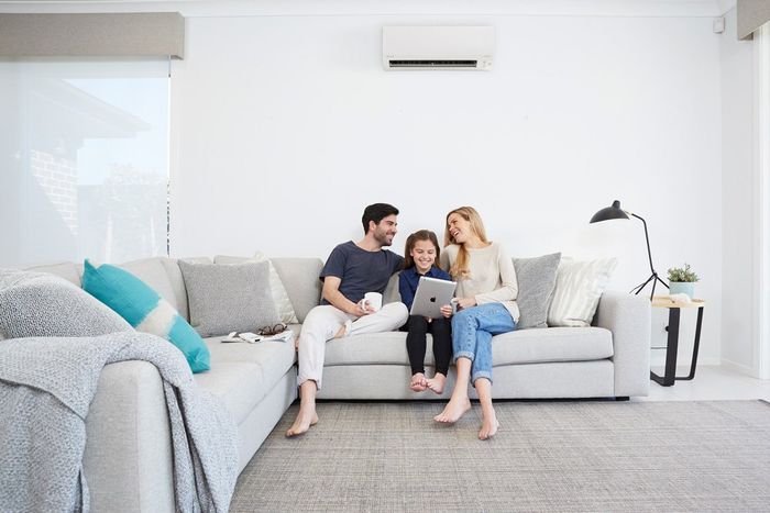 Family on Couch — Bairnsdale, VIC — EGRAC Heating & Cooling