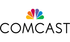 A comcast logo with a colorful nbc logo on a white background.