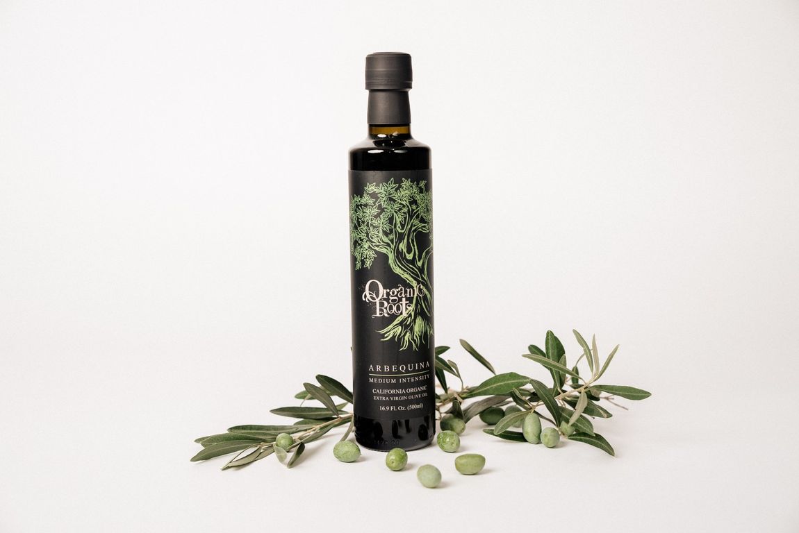 organic roots bottle with olive leaves