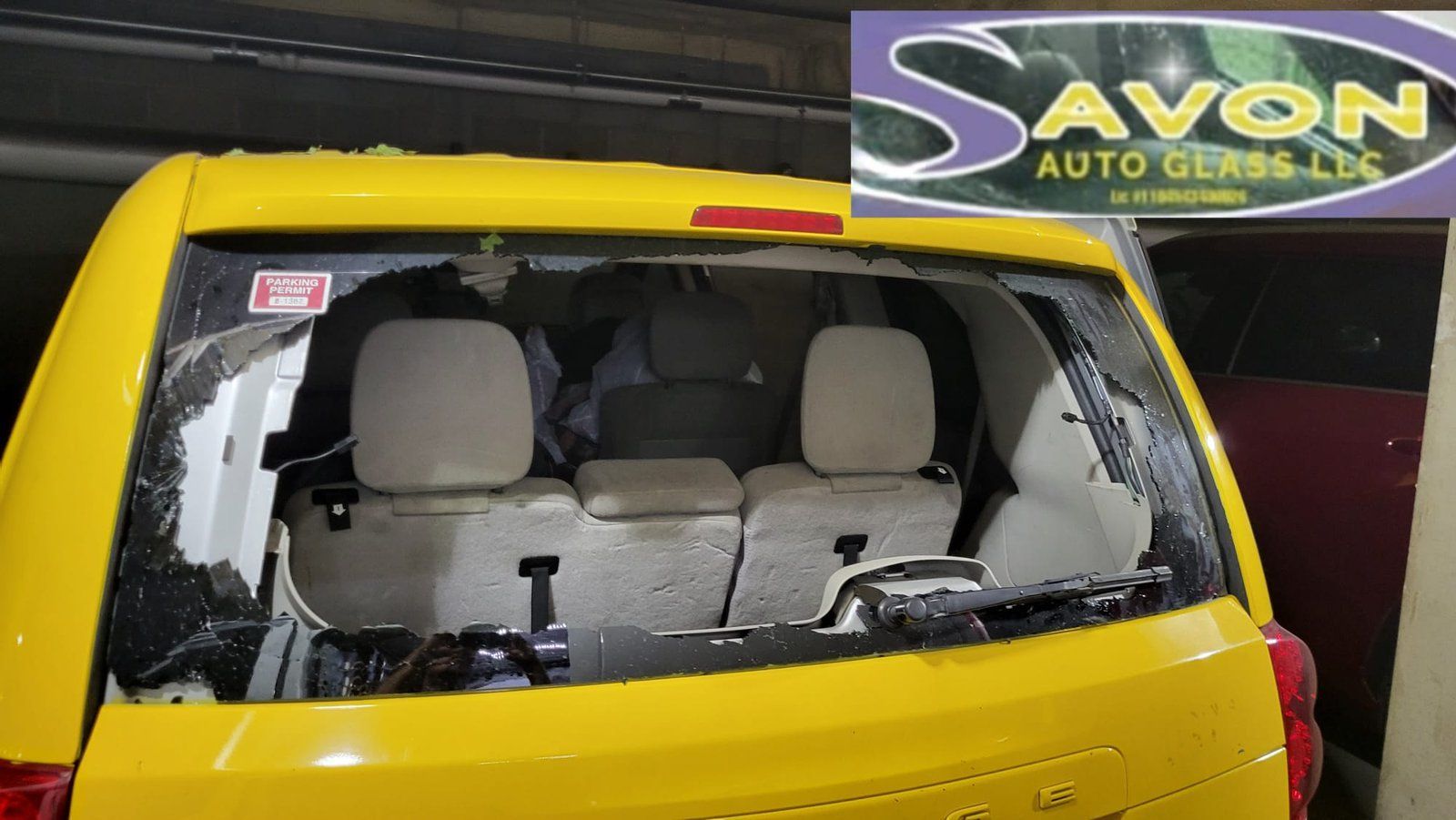 Yellow SUV with shattered rear window; Savon Auto Glass logo in corner.