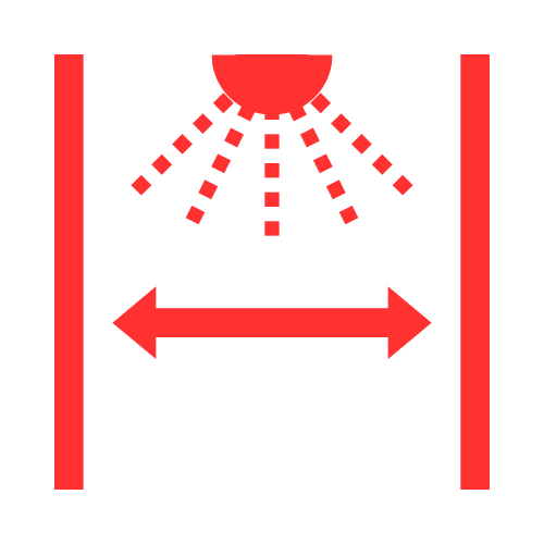 Symbole d'un gicleur rouge avec jet entre deux murs et flèche pointant entre les murs.