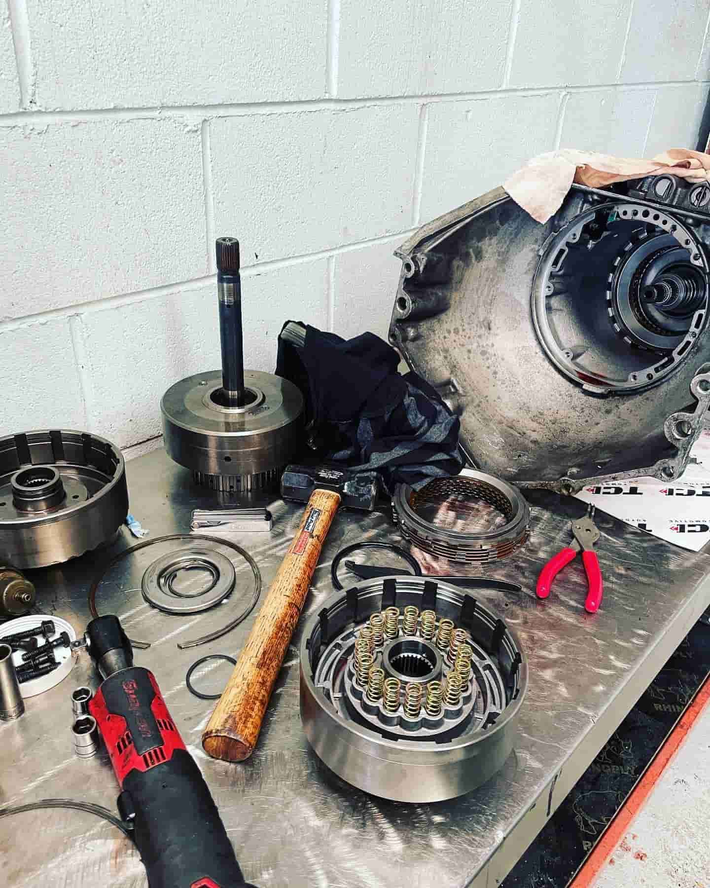 A Table With A Hammer, Pliers, And Other Tools On It — ProStreet Automotive & Fabrication In Cardiff, NSW