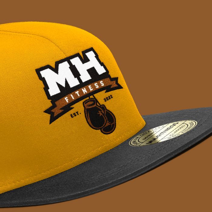 MH Fitness logo design mocked up on to embroided cap