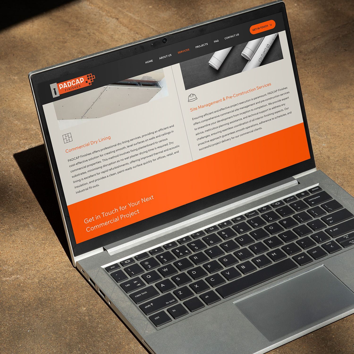 PADCAP Finishes Website Design by Pickle, laptop mockup