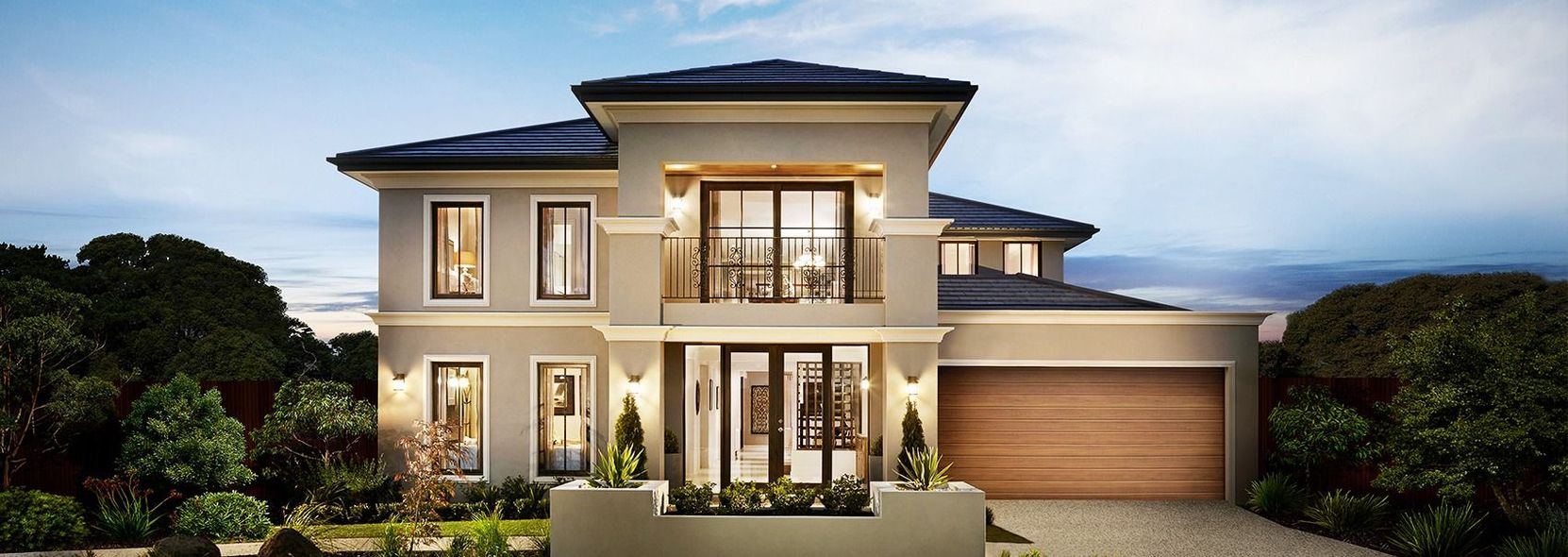 A large house with a lot of windows and a garage