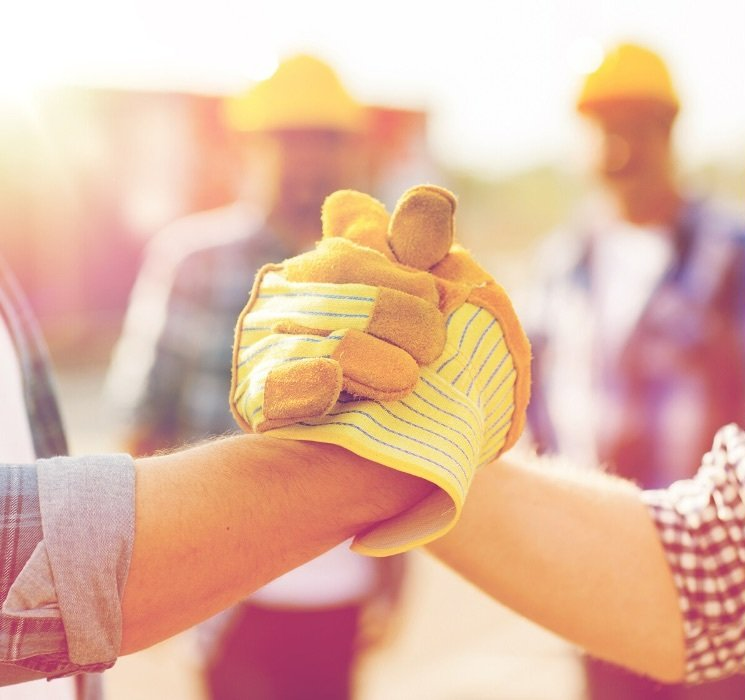 Guys Shaking Hands with Construction Gloves | Dorn Homes | Prescott, AZ 86305
