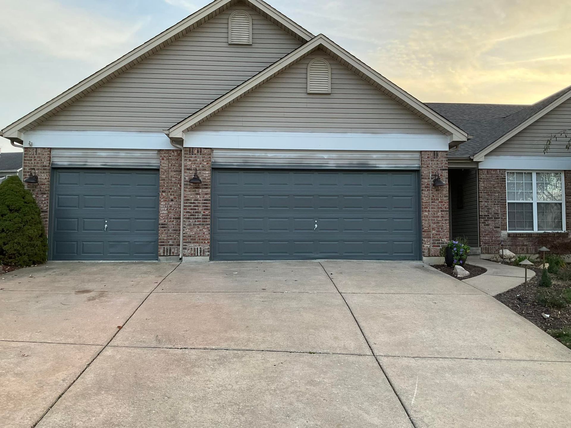 Kitchen cabinets: white, open upper cabinet above a microwave, near a stove and countertop.